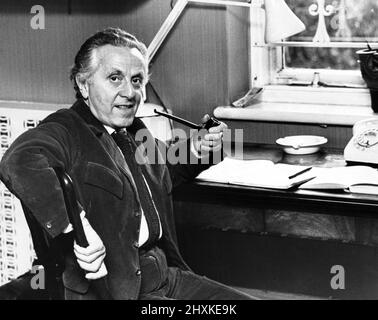 Leo Abse, MP for the Pontypool division of Monmouthshire, pictured at this desk in his study in his St John's Wood home in London. 18th October 1976. Stock Photo