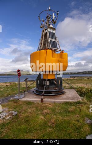 Bouy at Valencia Island lighthouse on the Atlantic coast of County Kerry, Ireland Stock Photo