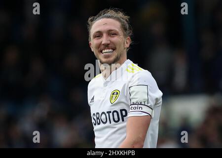 Luke Ayling #2 of Leeds United smiles and laughs with the Leeds United supporters after the game Stock Photo
