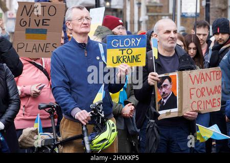 London, UK. 13th Mar, 2022. People supporting Ukraine gather in Whitehall. They are asking the British Government to do more to help their country which Russia has invaded.Demonstration in support of Ukraine. Credit: Mark Thomas/Alamy Live News Stock Photo