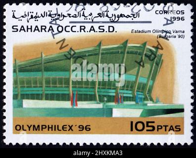 SAHARA - CIRCA 1996: a stamp printed in Sahrawi Arab Democratic Republic shows Olympic stadium, Varna, circa 1996 Stock Photo