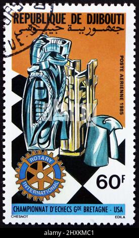 DJIBOUTI - CIRCA 1985: a stamp printed in Djibouti shows chess board and pieces, Rotary service club, circa 1985 Stock Photo