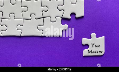 Motivational and inspirational quote on missing jigsaw puzzle - You matter. Motivational concept Stock Photo