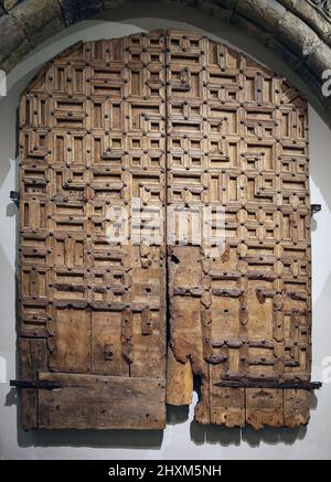 Door. 14th century. Wood with traces of polychrome. Monastery of St María de Carrizo (?).  Spain. Frederic Marés Museum. Barcelona, Spain Stock Photo