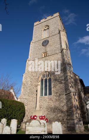 The saxon tower of Weybourne Priory Church in North Norfolk, UK on a beautiful blue sky day Stock Photo