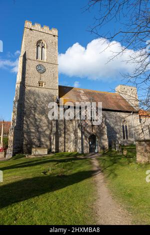 Side view of Weybourne Church in North Norfolk, UK on a beautiful blue sky day Stock Photo