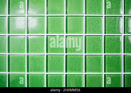 Bright green with white grout retro tile backsplash background Stock Photo