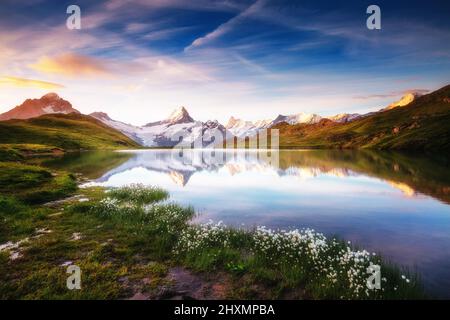 Great view of Mt. Schreckhorn and Wetterhorn above Bachalpsee lake. Dramatic and picturesque scene. Popular tourist attraction. Location place Swiss a Stock Photo