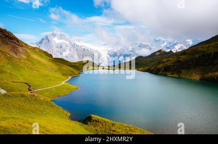 Great view of Mt. Schreckhorn and Wetterhorn above Bachalpsee lake. Dramatic and picturesque scene. Popular tourist attraction. Location Swiss alp, Be Stock Photo