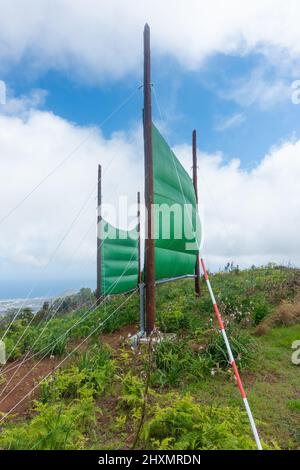 Cloud harvesting, fog catching nets, netting used to collect water from low clouds/mist/fog in mountains on Gran Canaria, Canary Islands, Spain Stock Photo