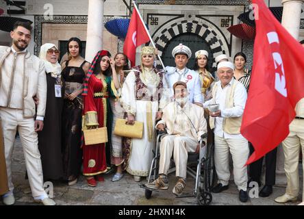 Tunis, Tunisia. 13th Mar, 2022. People dressed in national costume attend a celebration for the national day of traditional dress in Tunis, Tunisia, on March 13, 2022. Credit: Adel Ezzine/Xinhua/Alamy Live News Stock Photo