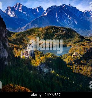 Neuschwanstein Castle (Schloss Neuschwanstein) in fall colors – Bavaria, Fussen, Germany. Stock Photo