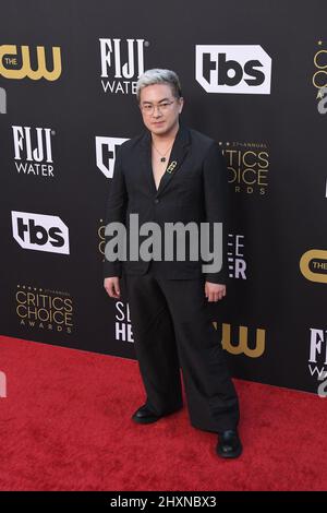 Los Angeles, USA. 13th Mar, 2022. Bowen Yang arrives at the 27th Annual Critics Choice Awards held at The Fairmont Century Plaza in Los Angeles, CA on Sunday, ?March 13, 2022. (Photo By Sthanlee B. Mirador/Sipa USA) Credit: Sipa USA/Alamy Live News Stock Photo