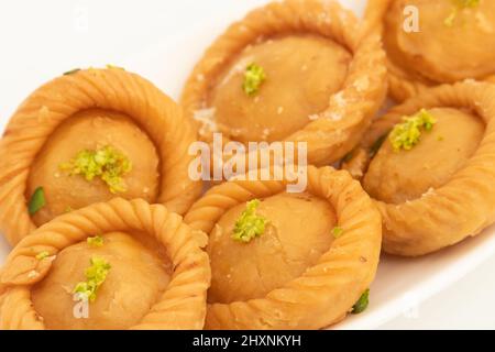 Chandrakala Gujia Mithai Also Called Suryakala Gujiya, Pirukiya, Pirukia, Pedakiya, Karanji, Basundi Gughra Made Of Suji Ghee Stuffed With Mawa Khoya Stock Photo