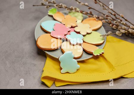 Homemade easter cookies in the shape of a funny rabbit on plate. Stock Photo