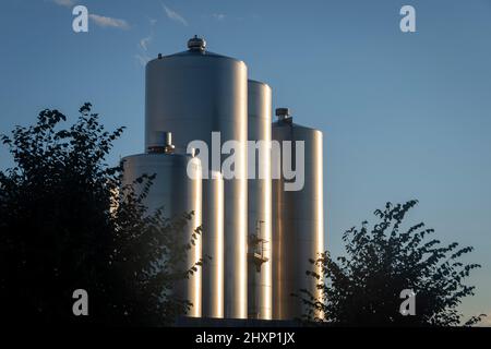 Storage silos at milk factory near Pahiatua, Tararua District, North Island, New Zealand Stock Photo