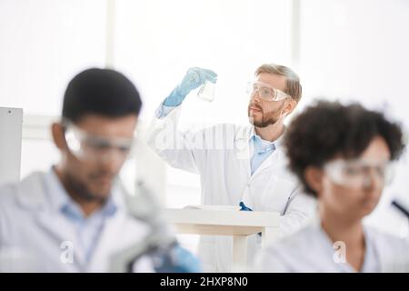 image a group of scientists working in a laboratory. Stock Photo