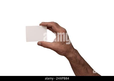 male hand holding blank  white business card mock up against white background ,copy space . Stock Photo