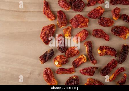 Slices of sun-dried tomatoes, top view Stock Photo