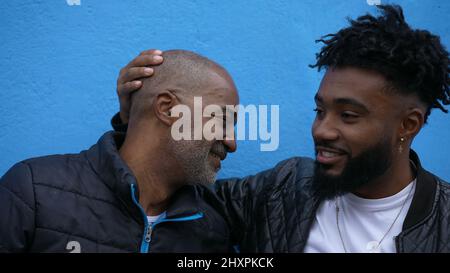 Father and son relationship embrace and hug tender moment together Stock Photo