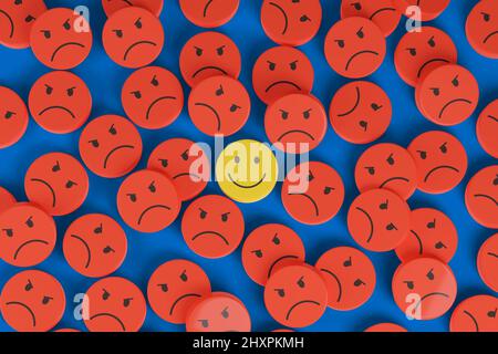 Happy face among many other angry faces. Positive attitude concept. 3d illustration. Stock Photo