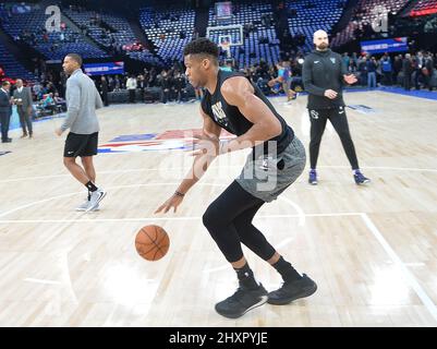 Giannis Antetokounmpo #34 and teammate of the Milwaukee Bucks shoots the ball during practice Stock Photo