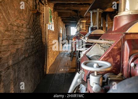 Interior shot of an old historic factory with machinery Stock Photo