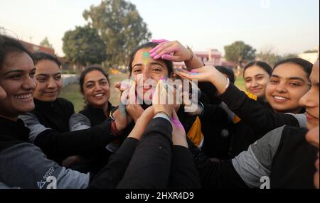 Jammu, Indian-controlled Kashmir. 14th Mar, 2022. College students celebrate the Holi festival, the festival of colors, in Jammu, the winter capital of Indian-controlled Kashmir, on March 14, 2022. Credit: Str/Xinhua/Alamy Live News Stock Photo