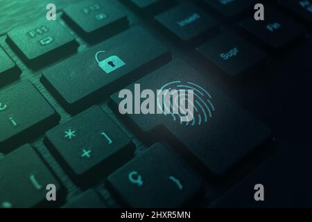 Security tech concept of fingerprint on keyboard. Unlock user. Global technology. Data protection and cyber security. Stock Photo