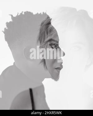 Portrait with multi exposure artistic effect of young african man and caucasian woman. Interracial relationship and marriage concept. Black and white Stock Photo