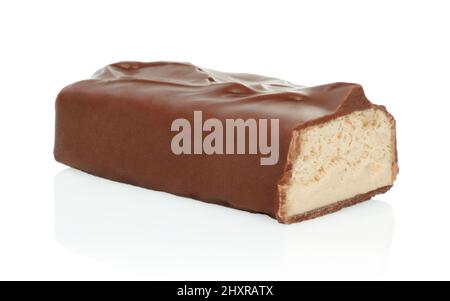 Broken chocolate bar with sweet filling isolated on white background close-up Stock Photo