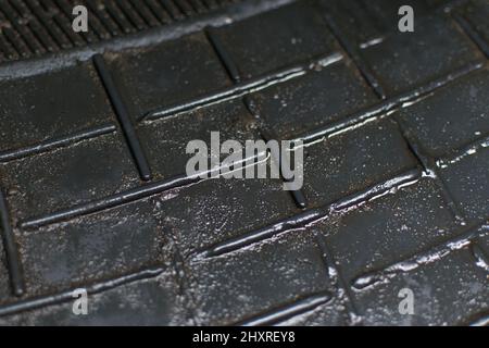 https://l450v.alamy.com/450v/2hxrey8/the-texture-of-the-rubber-mat-is-wet-and-dirty-2hxrey8.jpg