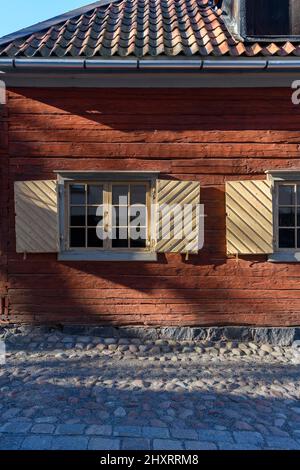 Beautiful Swedish buildings taken from around the country and rebuilt on an island to form the world's first open air museum Skansen, opening in 1891. Stock Photo