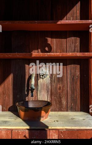 Beautiful Swedish buildings taken from around the country and rebuilt on an island to form the world's first open air museum Skansen, opening in 1891. Stock Photo