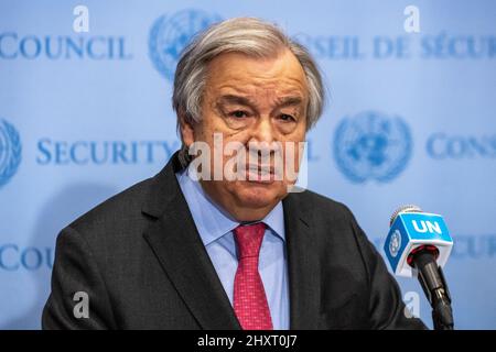 New York, USA. 14th Mar, 2022. United Nations Secretary-General Antonio Guterres talks to reporters after a UN Security Council meeting at the UN headquarters in New York city. Guterres said that 'It is time to stop the horror unleashed on the people of Ukraine and get on the path of diplomacy and peace,' and also stressed that 'The prospect of nuclear conflict, once unthinkable, is now back within the realm of possibility,' Credit: Enrique Shore/Alamy Live News Stock Photo