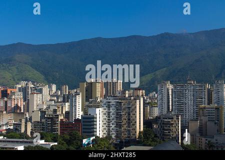 Beautiful view of tall buildings in Caracas, Venezuela with tall mountains in the background Stock Photo