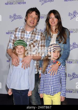 Jamie Oliver, wife Juliette Norton, daughters Poppy Oliver and Daisy Oliver at the 'Justin Bieber: Never Say Never' Los Angeles premiere held at Nokia Theatre L.A. Live. Stock Photo