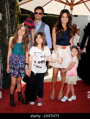 Brooke Burke, husband David Charvet and Family attending the 2011 John Varvatos Stuart House Benefit held at the John Varvatos Boutique in Los Angeles, USA. Stock Photo