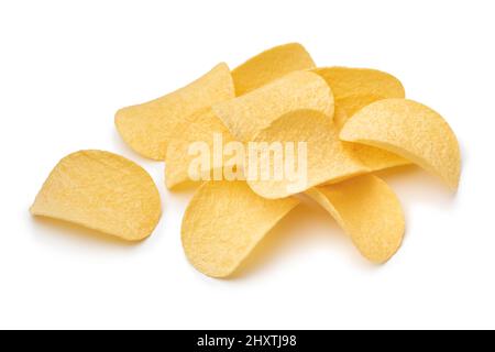 Heap of deep fried potato chips close up isolated on white background Stock Photo