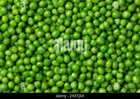 Fresh green peas close full frame as background Stock Photo