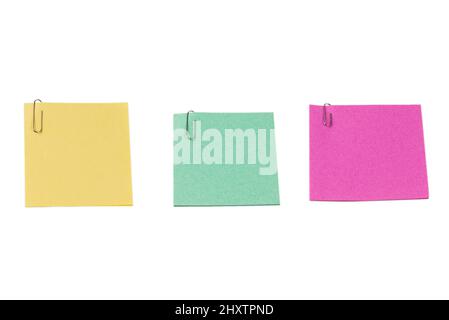 A sticker and a paper clip isolated on a white background. Copy space. Stock Photo