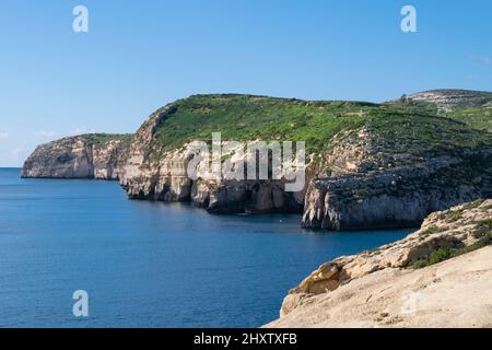 The bay and low cliffs of the drowned ria valley of Mgarr ix-Xini, in the island of Gozo, Malta Stock Photo