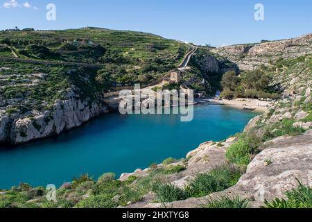 The bay and low cliffs of the drowned ria valley of Mgarr ix-Xini, in the island of Gozo, Malta Stock Photo