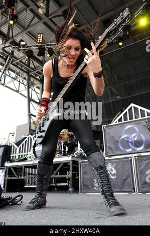 Bass Guitarist Emma Anzai of the band Sick Puppies performs at Rock on