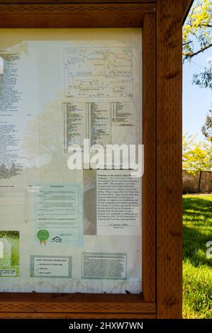 An outdoor bulletin board in the Peter Saar Cemetery in the Panther Lake area of Kent, Washington. Stock Photo