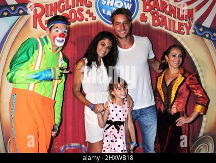 Lindsay Hartley, Justin Hartley and daughter Isabella at Ringling Bros. & Barnum and Bailey & Starlight Children's Foundation's premiere of 'Fully Charged' at Staples Center on July 21, 2011 in Los Angeles, California. Stock Photo