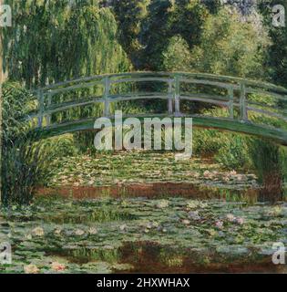 The Japanese Footbridge and the Water Lily Pool Giverny oil on canvas painting by impressionist Claude Monet created in 1899 Stock Photo