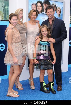 Harry Connick Jr., Jill Goodacre, daughters Georgia, Sarah and Charlotte attending the 'Dolphin Tale' world premiere held at The Village Theatre in Westwood, Los Angeles. Stock Photo