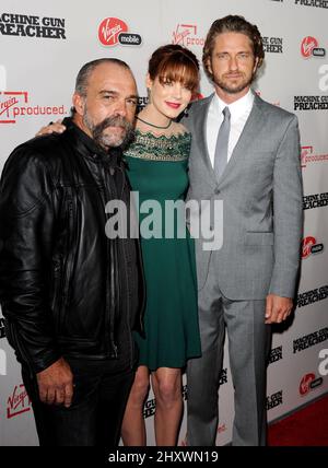 Sam Childers, Michelle Monaghan and Gerard Butler arriving for the 'Machine Gun Preacher' premiere held at the Academy of Television Arts & Sciences in Los Angeles, USA. Stock Photo