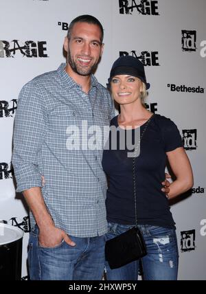 Jaime Pressly and Hamzi Hijazi attends the 'Rage' video game launch party in Chinatown. Los Angeles, September 30, 2011. Stock Photo